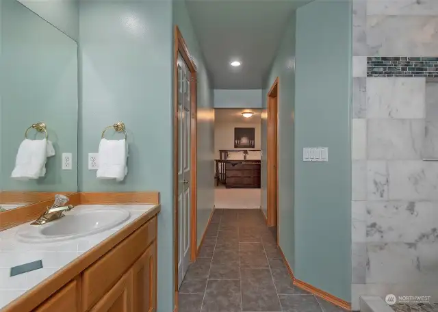 Primary Bathroom with walk in shower and closet.