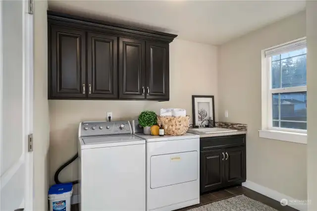 Large laundry room with sink is the prefect space for every day chores.