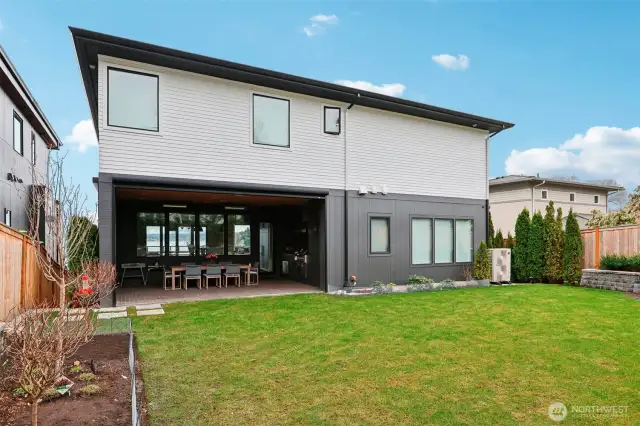 Flat fully fenced backyard can be enjoyed year round.