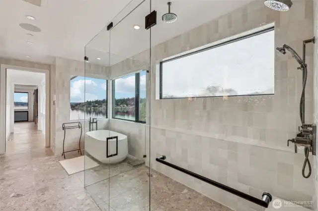 Opulent Primary Bath is roomy and bright, top off with a tranquil lake view!
