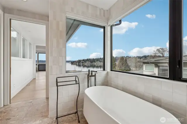 Opulent Primary Bath is roomy and bright, top off with a tranquil lake view!