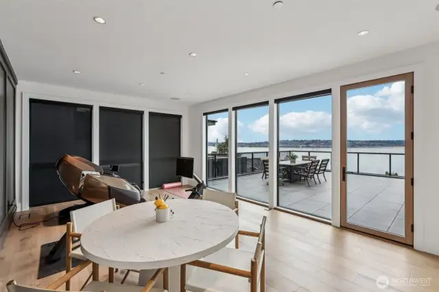 Spacious flex room on 3rd level completes with a sunny patio with panoramic lake views.