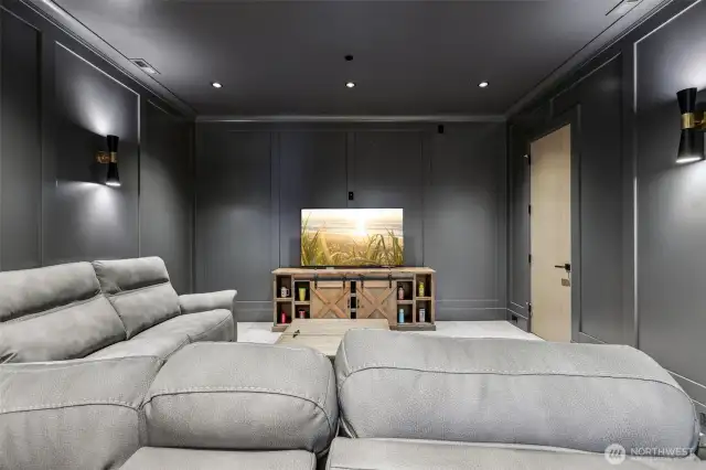 Home theater prewired for your home entertainment complete with wet-bar, wine cooler, and popcorn machine!