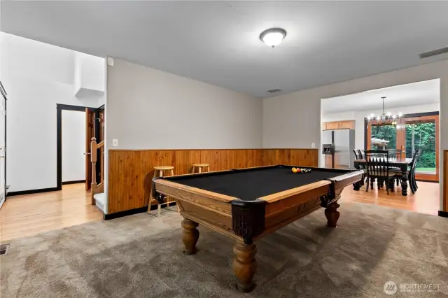 The living room is currently being used for games of pool