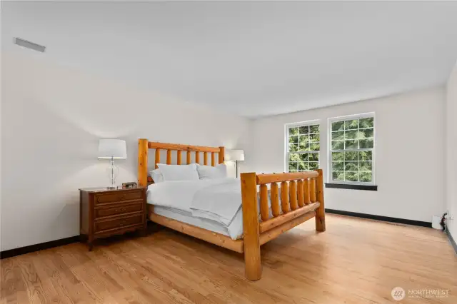Quiet primary suite easily fits a California King