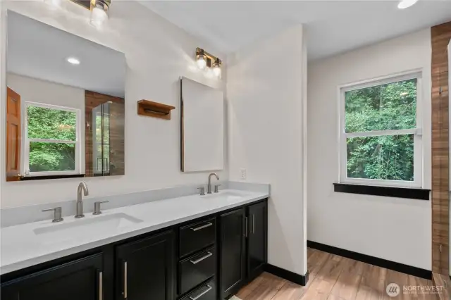 En-suite bathroom with heated floors medicine cabinets