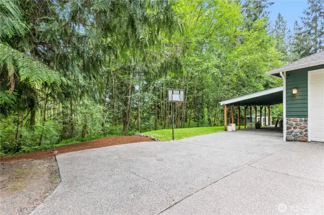 Massive carport offers 2+ additional covered parking spaces