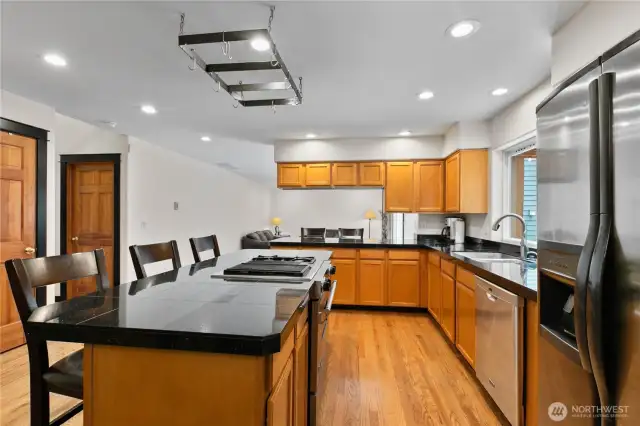 Generous kitchen island and plenty of counter and cabinet space
