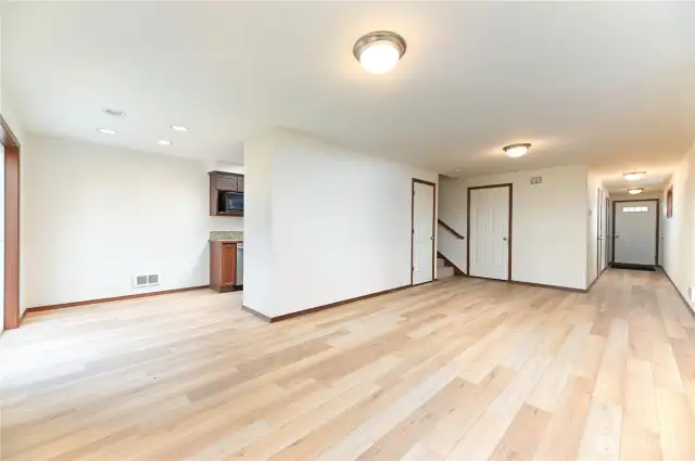 living room and dining room, brand new floors throughout