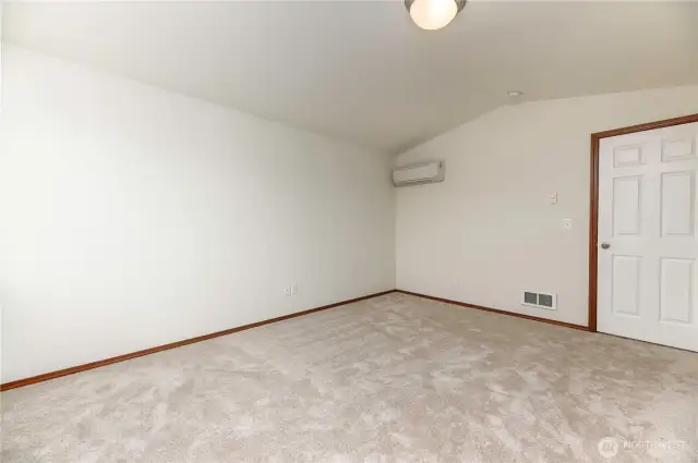 primary bedroom with ductless mini split