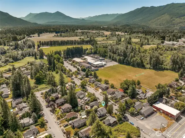 Expansive Centennial Park & Centennial Fields & Trail is just a block up the street offering baseball  diamond, extensive trail system, biking trail, playgrounds and acres of adventures. Three Forks Off  Leash Riverfront Dog Park is also less than 1/4 mile stroll.