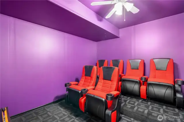 Dedicated home theater with built-in seating.