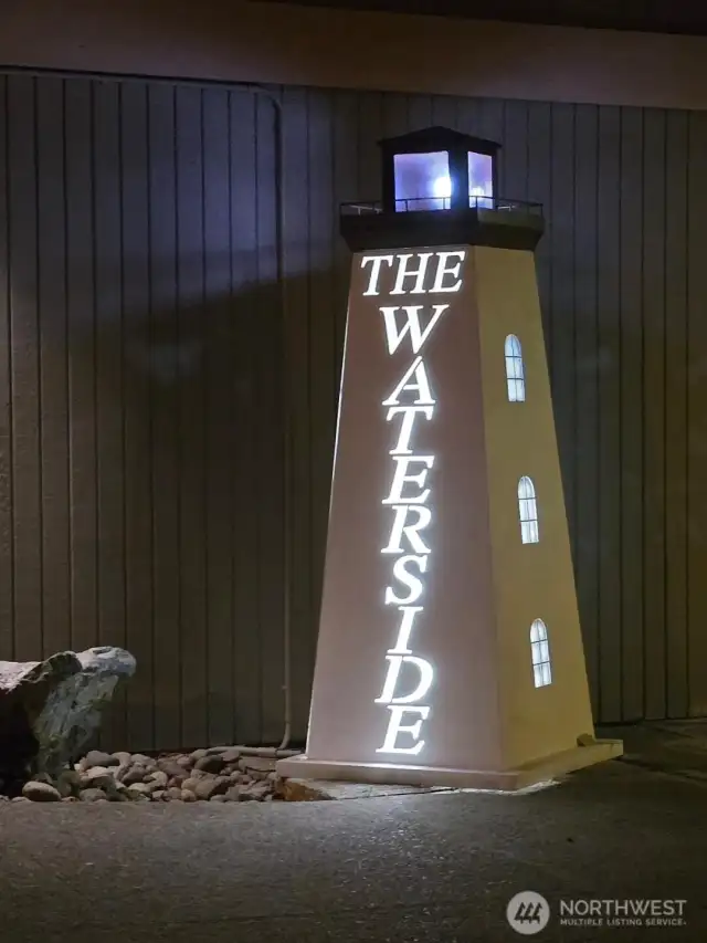 The light house greets you at the entrance to the building day or night.
