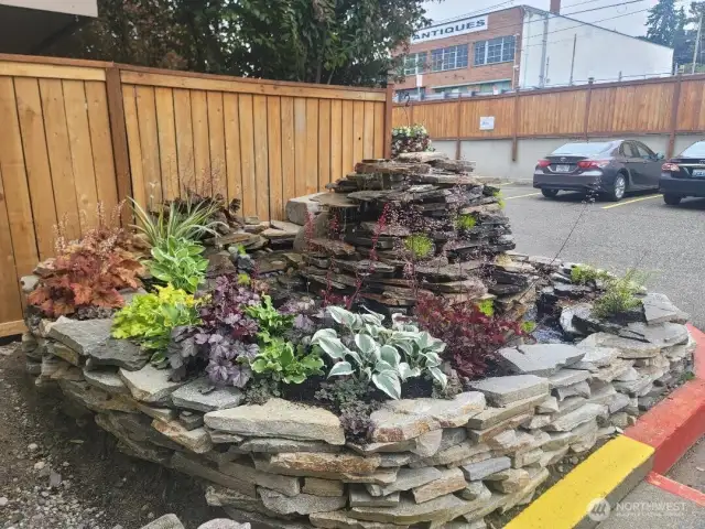 The soothing sounds of cascading water fills the air by the 2nd entrance