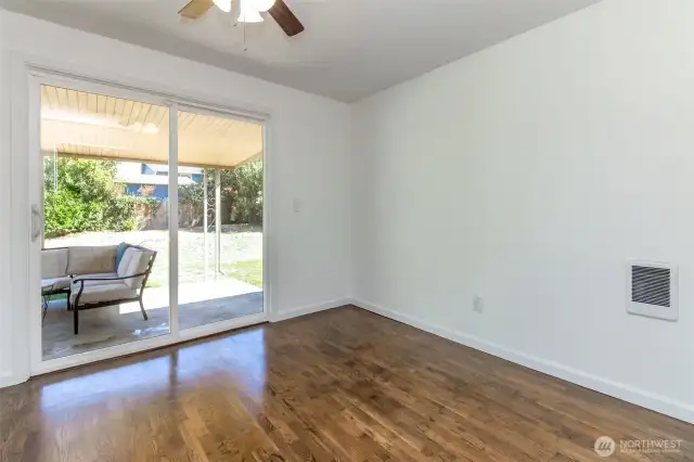 Large eat in dining room with slider to outdoor covered patio