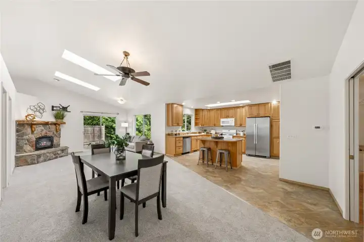 Bright, open-concept living with new carpeting throughout.
