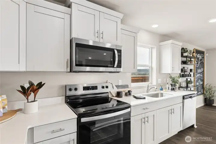 Photo is of a similar home. Colors and materials may vary.