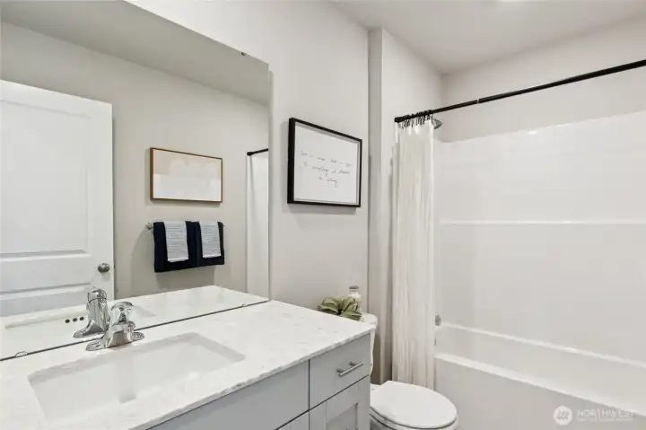 Photo is of a similar home. Colors and materials may vary.