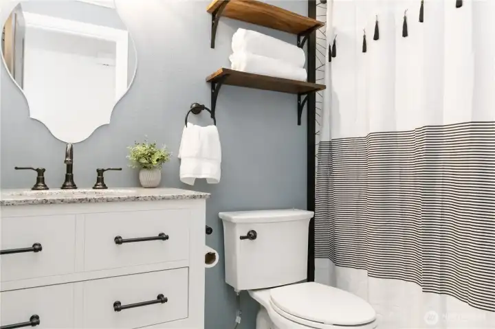 Completely updated bathrooms with darling fixtures