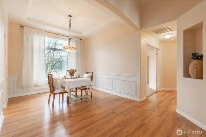Dining Room easily turned into a more practical space such as study, libary, entertainment with bar or piano