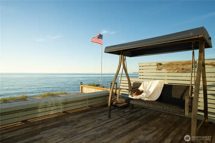 Large back deck is above the beach firepit.