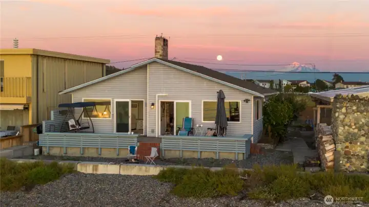 Waterfront side of the home at sunrise!