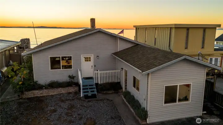 Front of the home with sunset beyond....