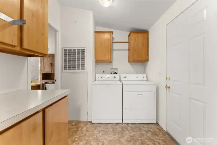 Laundry with appliances that convey with sale.