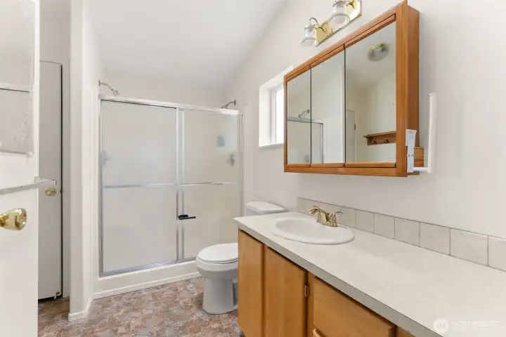 Primary Bath with walk in shower.
