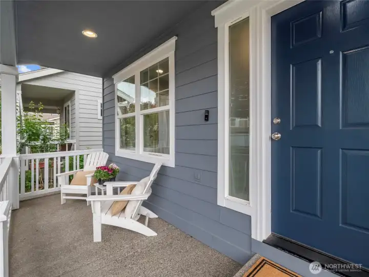 SWEET PORCH | Relax on the concrete porch and enjoy the view of your well-manicured front yard.