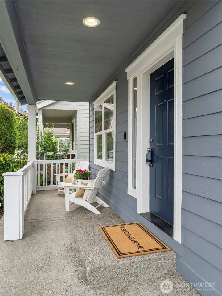 SWEET PORCH | Relax on the concrete porch and enjoy the view of your well-manicured front yard.