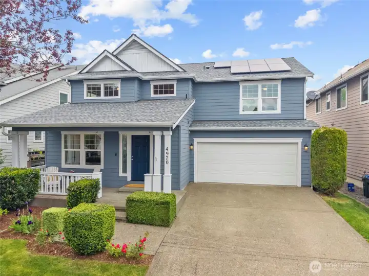 CURB APPEAL | New exterior paint, new roof and new solar panels all work together to make this home charming and smart.
