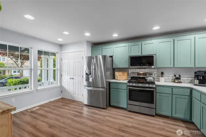 KITCHEN LOVE | With beautiful natural light from the large windows, you'll love spending time in this kitchen. NOTE: yes, there's plenty of space to add an island!