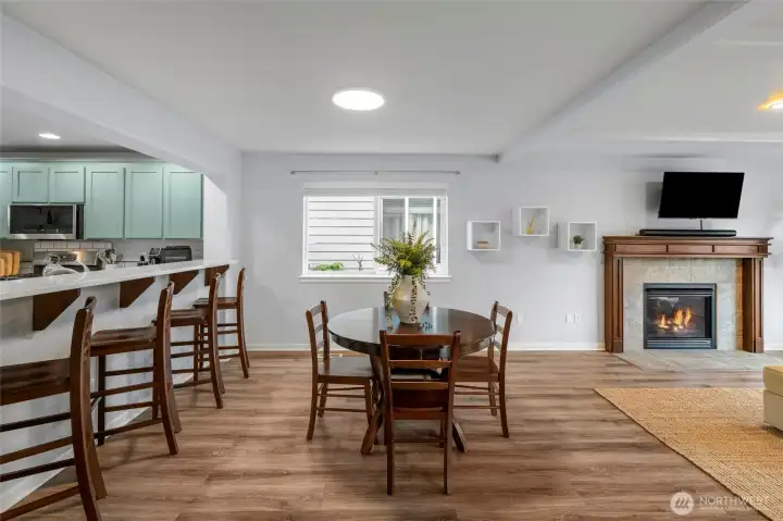 KITCHEN DINING CONNECTION | You'll love the way the kitchen is connected to the dining area via the big bar that seats 4.