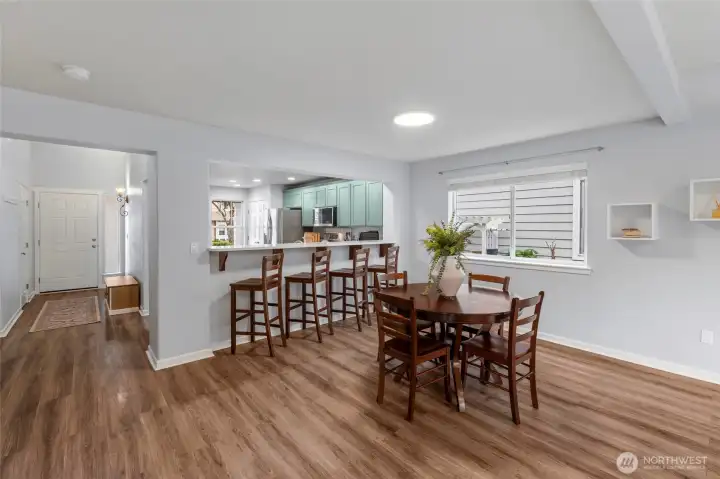 DINING OPTIONS ABOUND | With plenty of space for a large dining table AND bar seating, this home welcomes large gatherings.