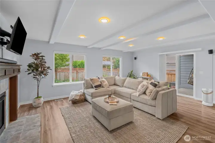 LIVING ROOM LIFESTYLE | Bring on your big sectional! There's plenty of space here. Note the sliding glass door that flows into the outdoor space.