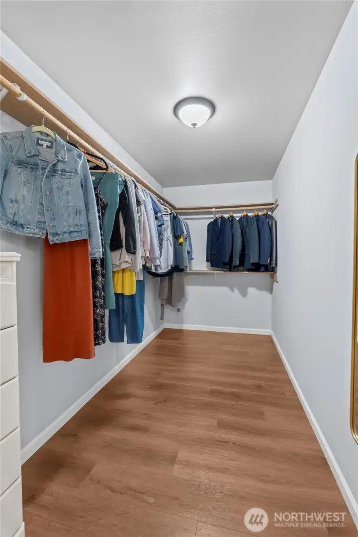PRIMARY WALK-IN CLOSET | There's so much space here you won't have to worry about sharing.