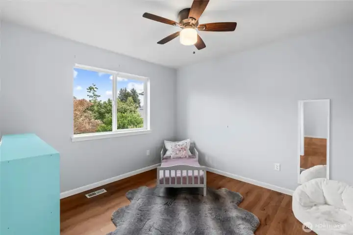 BEDROOM 3 | This bedroom is located at the back of the home to the right at the top of the stairs.
