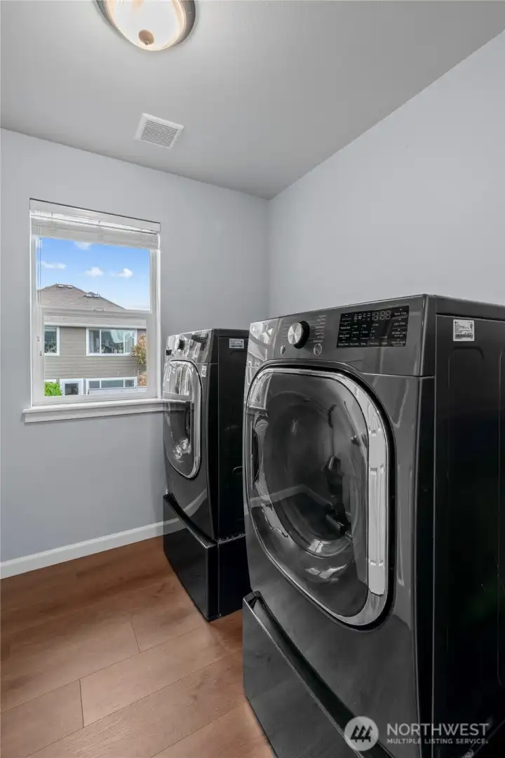 2ND FLOOR LAUNDRY | Conveniently located near all bedrooms, you'll love the functionality of this laundry room. Bonus: the washer and dryer stay with the home.