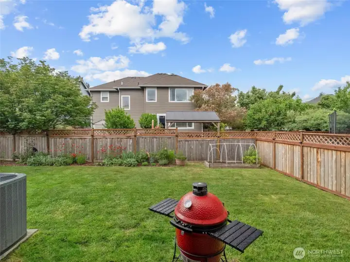 BACK YARD | There's so much secure space here in this fully-fenced backyard to enjoy the outdoors. Green thumb? There's a garden spot!