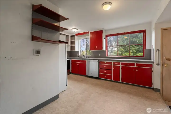 There is enough room for a small dining table in the wide passthrough.