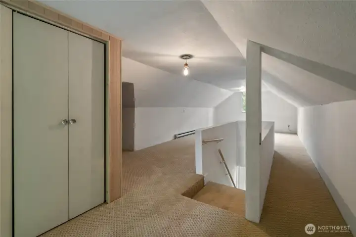 There is a large closet at the top of the stairs.