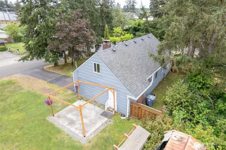 Mature trees offer privacy from the street.
