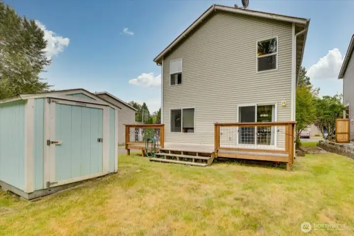 Beautiful Cedar Deck & loads of potential for an amazing backyard ~ easy to fence for additional privacy.