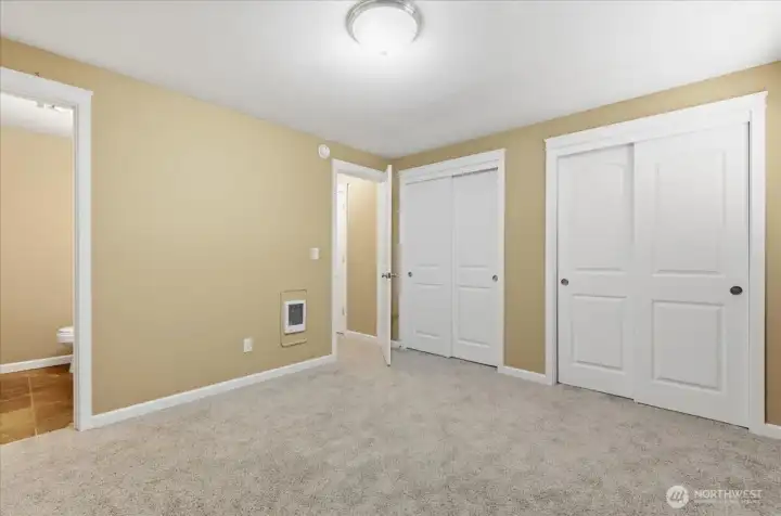 Primary Bedroom, w/ Ensuite 1/2 Bath & Double Closets