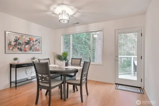 Lovely dining room with door to your deck. Corner unit with views to greenbelt.