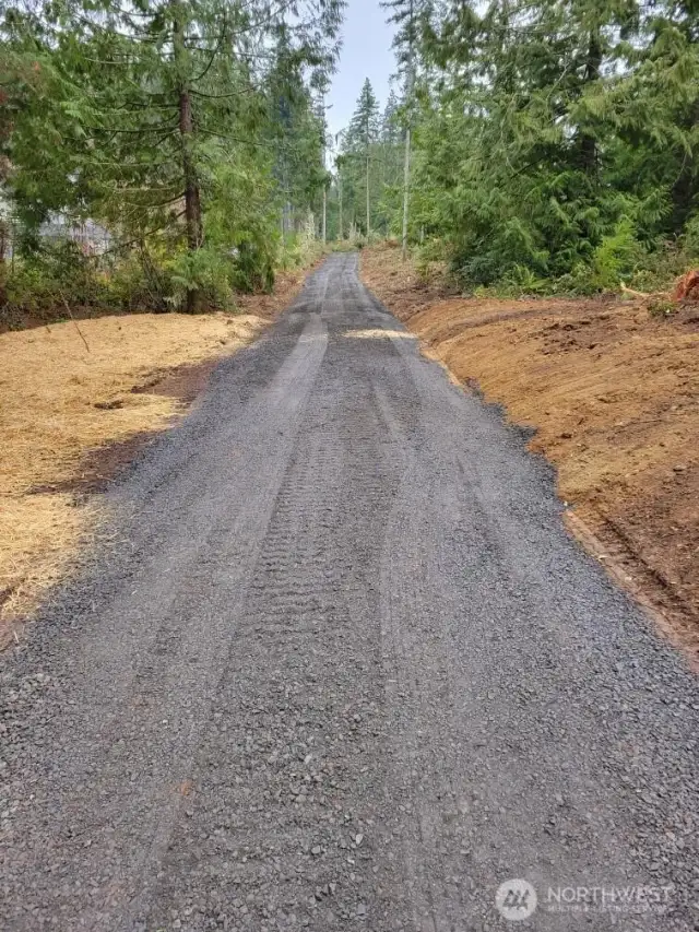 Brand new access road to the cleared home site is IN and ready for you to view TODAY!