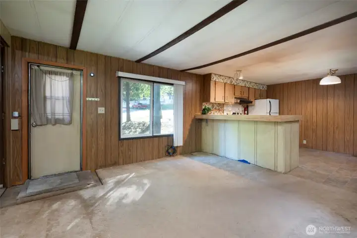 Front door into living room and kitchen.