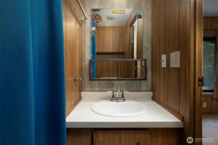 Primary half bathroom.