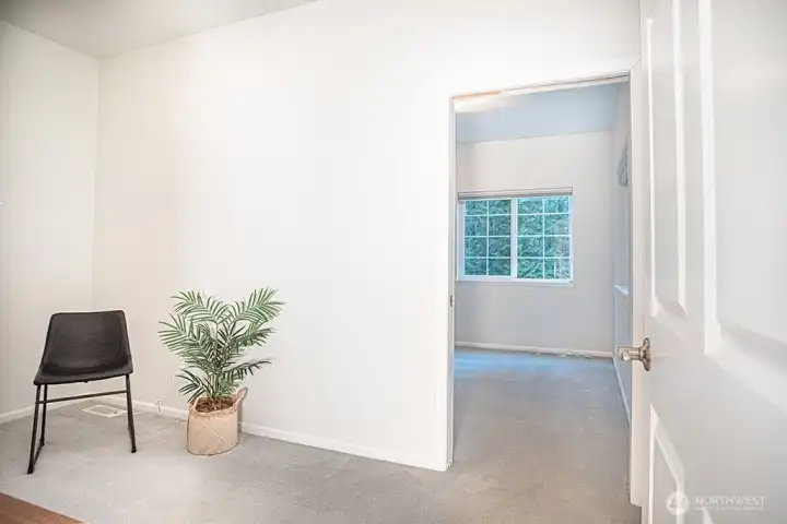 Bonus room with 3rd bedroom beyond.